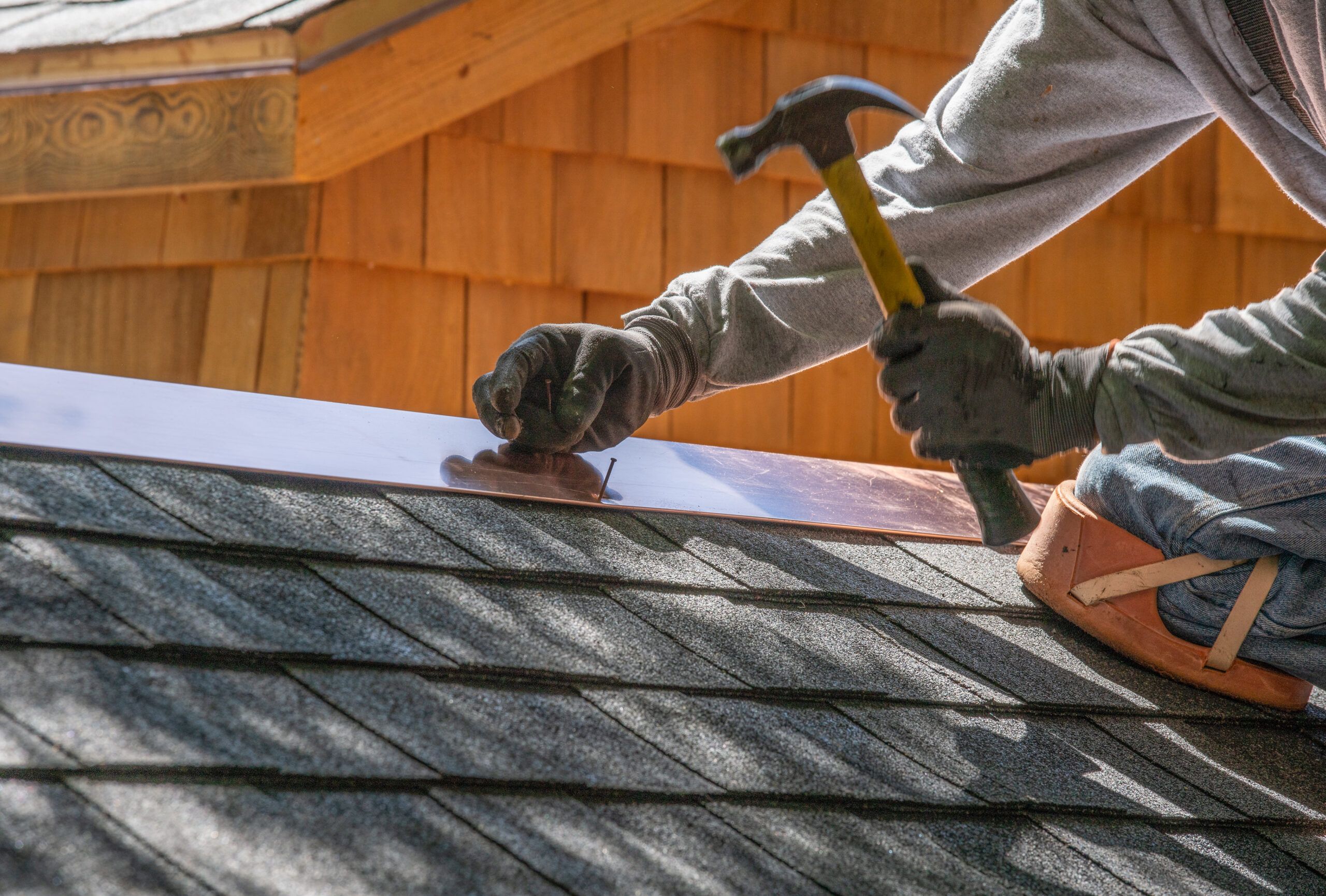 Roof Repairs in Clayton, MI | Pro Craft Home Products Local roofing contractors repairing a residential roof in Clayton, Michigan