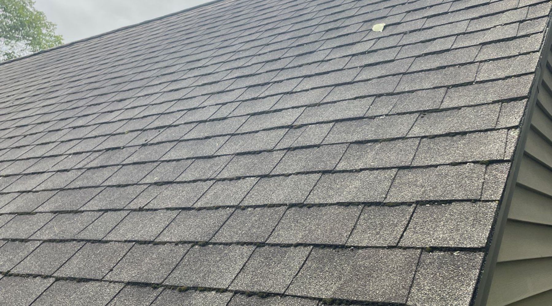 Asphalt shingle roofing installation on a new residential build