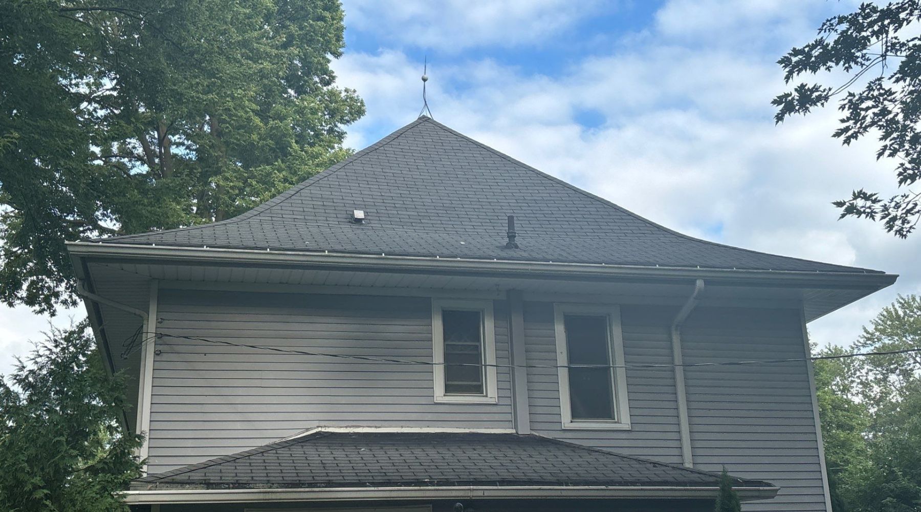 Roofing Contractor Trusted by Families in Library Village Toledo Local roofing contractor completing a family home roof replacement in Library Village Toledo