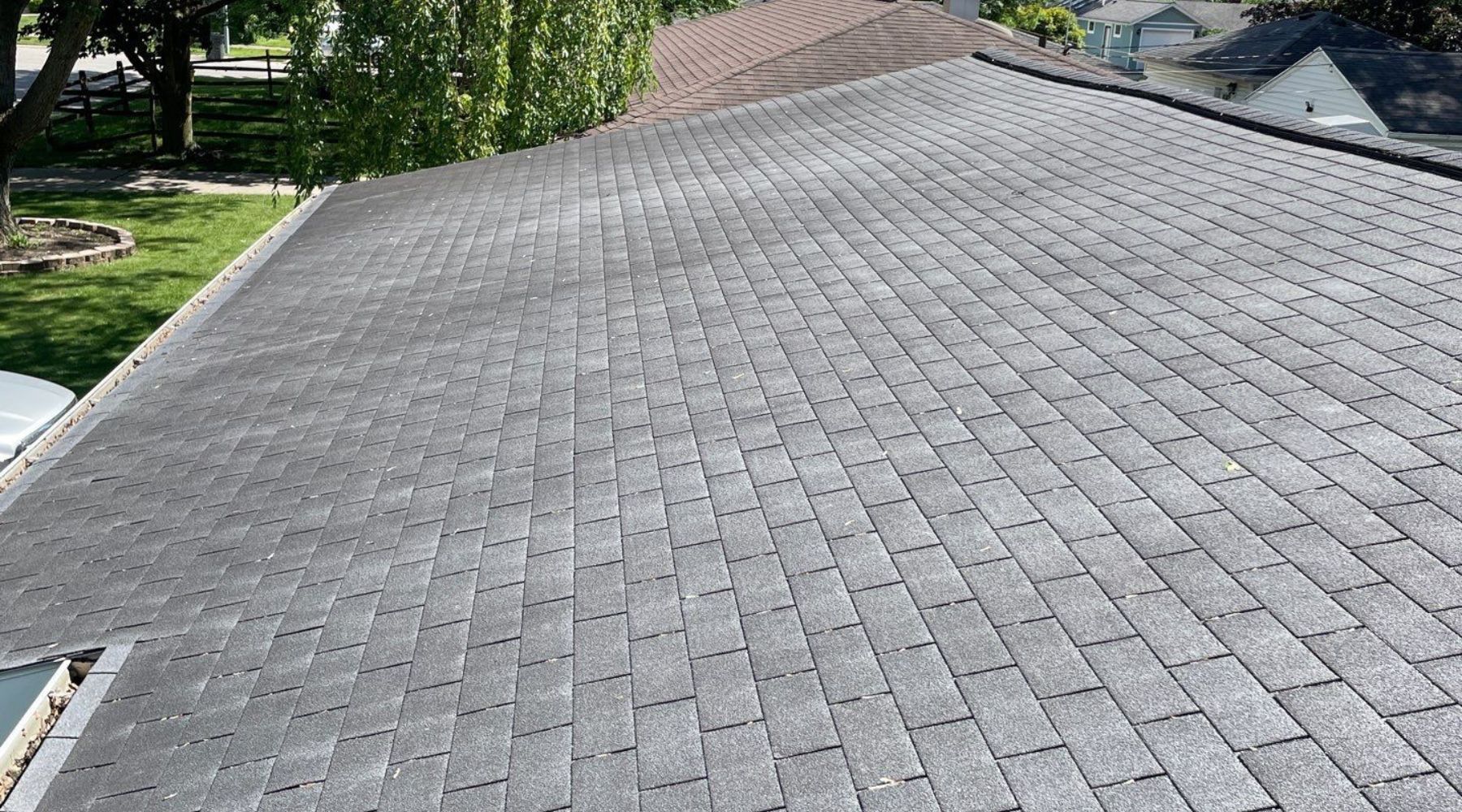 Residential roof replacement after hail and wind storm
