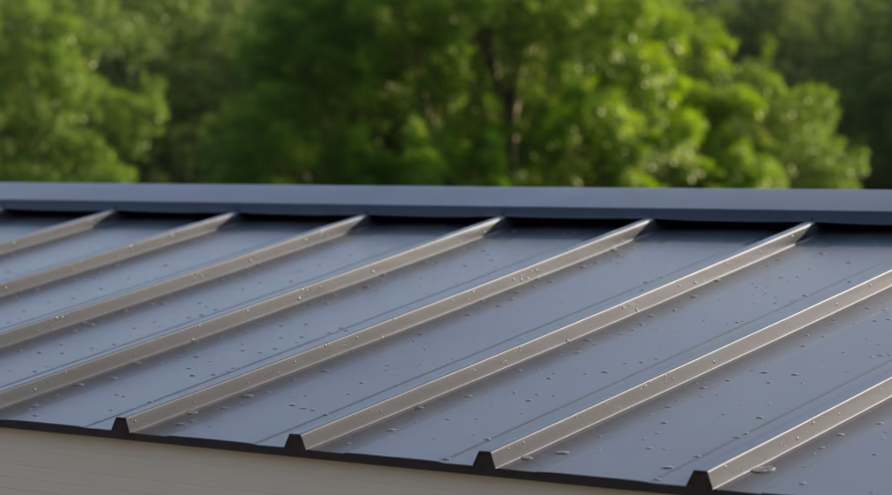Close-up of a clean standing seam metal roof with water droplets after rain.